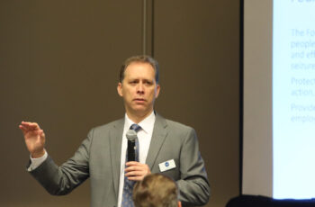 MVP Law Attorney Greg Goheen giving a presentation